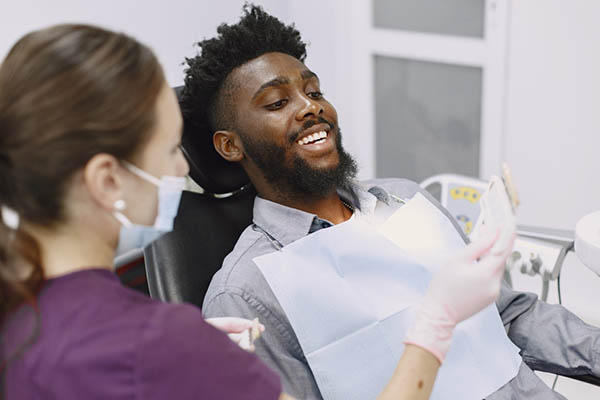man being offered dental services in Ohio