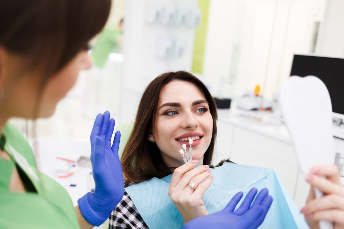 matching porcelain veneers to natural teeth in dental exam