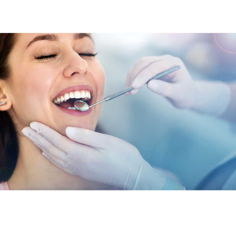 Female patient smiles at the dentist.