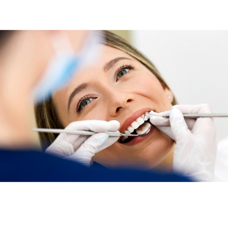 Patient smiling during dental exam at Ames Dentistry