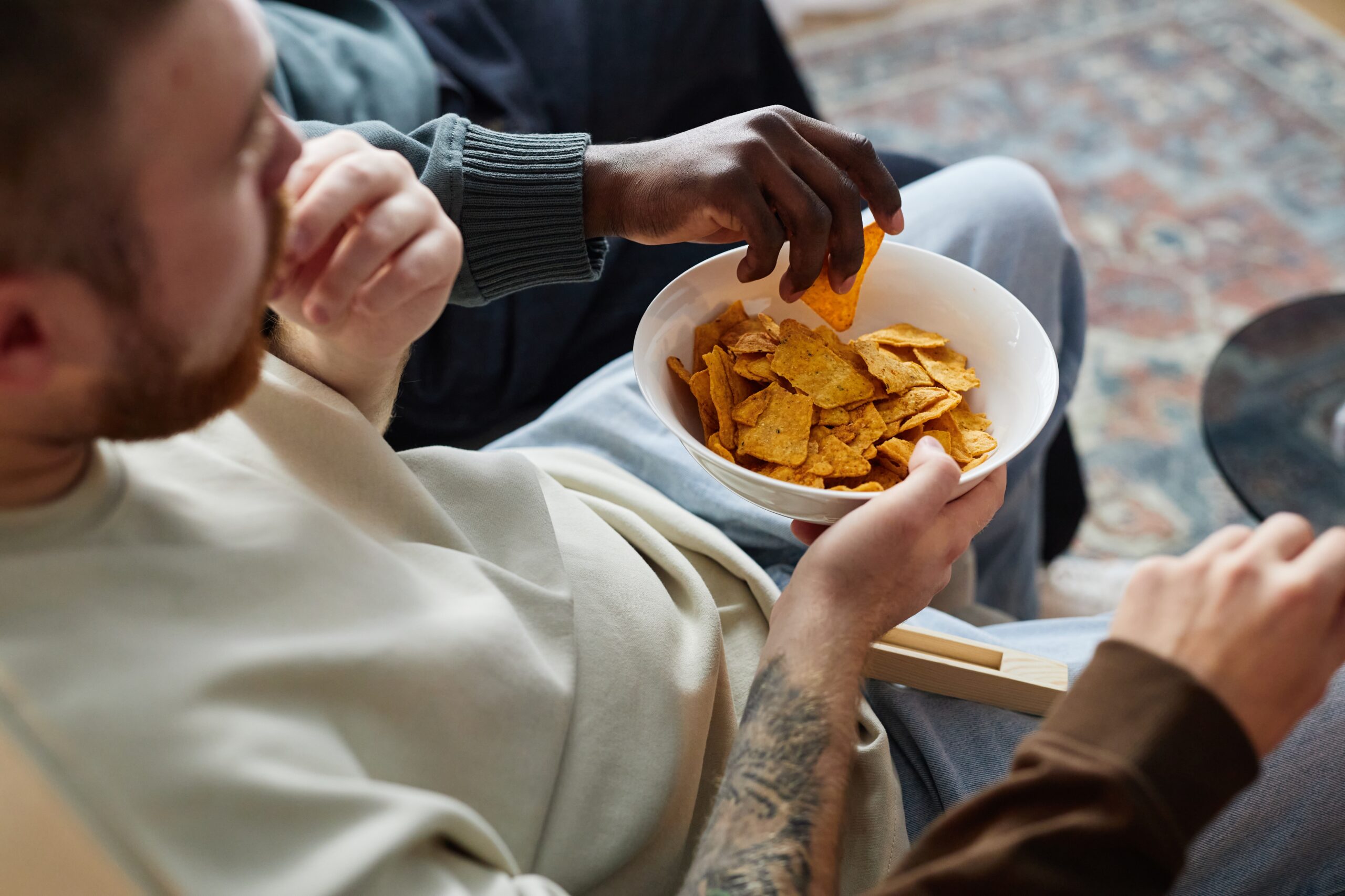 Person eating snacks