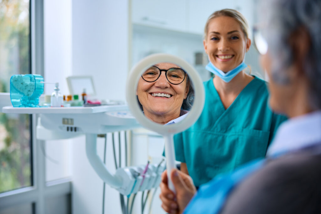 Elderly patient is happy with their family dentistry care at Ames Dentistry
